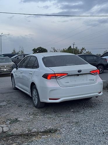Продажа авто: Toyota Corolla: 2022 г., 1.8 л, Вариатор, Гибрид, Седан — 5
