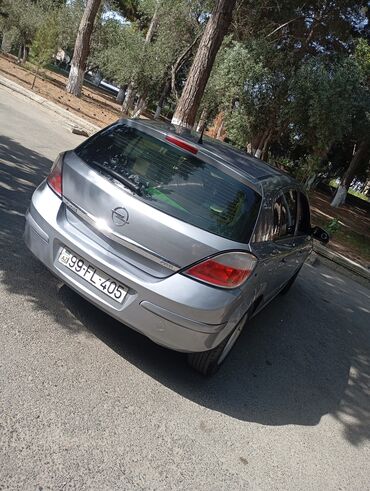 Qazanlar: Opel Astra: 1.6 l | 2006 il Hetçbek