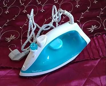 ütü şəkli: Tefal buxarlı ütü - Kompakt və yüngül korpus, mavi-ağ dizayn - Buxar — 1