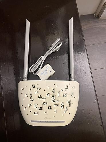 TP-Link simsiz router Xüsusiyyətlər: - İki güclü xarici antenna – ev