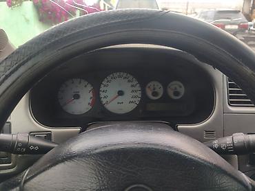 салон машина: Nissan Primera: 1999 г., 2 л, Автомат, Бензин, Седан — 9