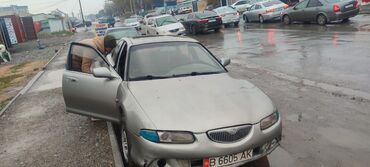 запчасти на газонокосилки: Mazda 626: 1993 г., 1.8 л, Механика, Бензин, Седан