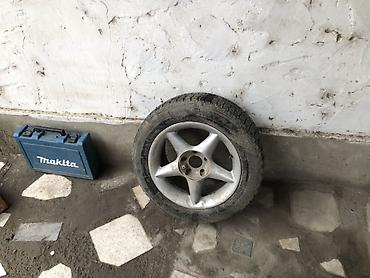 Литой диск с шиной 205/60 R16 1шт От ауди На резине есть шишка не