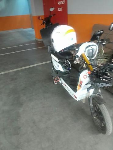 lining pantera: Электроскутер Panda (наклейки Repsol, Pando) в городской компоновке — 2