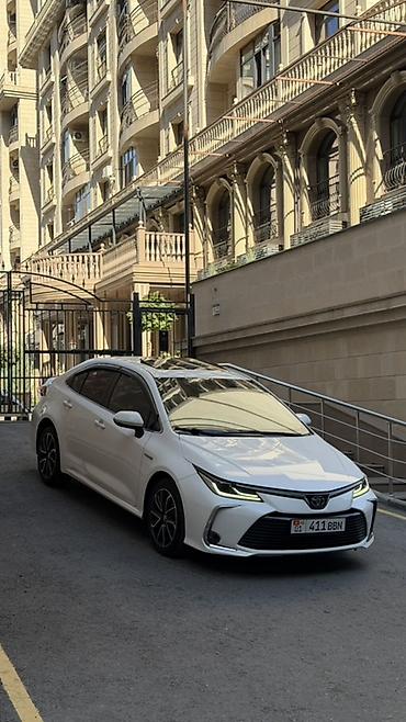 byd e6: Toyota Corolla: 2020 г., 1.8 л, Автомат, Гибрид, Седан — 2