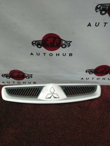 Другие автозапчасти: Решетка радиатора Mitsubishi Colt Z25A 1300 2004 (б/у) КУЗОВНЫЕ ДЕТАЛИ
