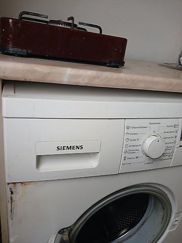 Siemens önyükləməli paltaryuyan maşın – 7 kq, E12-46 Xüsusiyyətlər: -