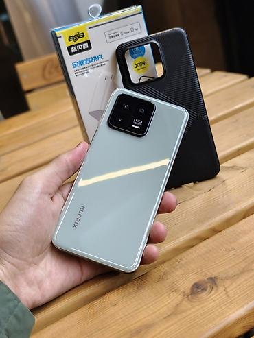 флагманский телефон: Xiaomi, 13, Новый, 256 ГБ, цвет - Зеленый, 1 SIM, 2 SIM — 1