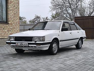 mini gps tracker: Toyota Camry: 1984 г., 2 л, Автомат, Бензин — 1
