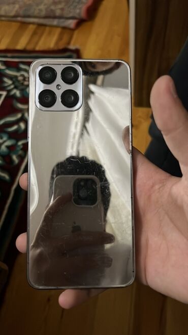 maket telefon: Güzgü arxa örtüklü smartfon. - Rəng: gümüşü/çəhrayı tonlarda güzgü
