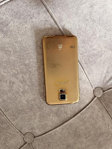 Мобильные телефоны и аксессуары: Смартфон Samsung Galaxy S5, цвет Gold. Основные характеристики: - — 2