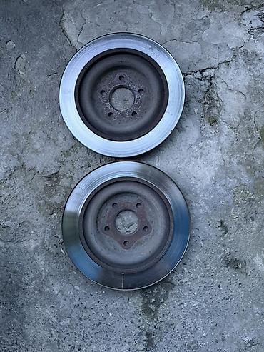 dəmir disk: Cüt ön əyləc diski - Material: tökmə dəmir - Çap: təxmini 260–280 mm — 1