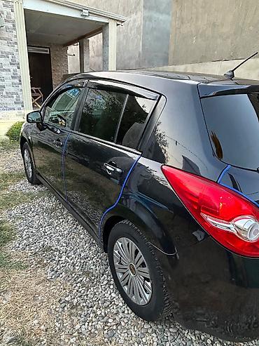 Транспорт: Nissan Tiida: 1.5 л | 2011 г. Хэтчбэк — 3