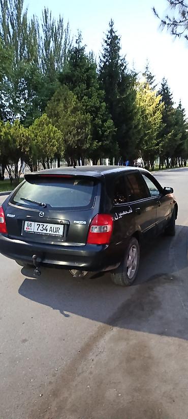 велоприцеп для детей: Mazda 323: 2002 г., Механика, Дизель, Хэтчбэк — 2