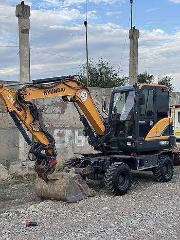 мини погрузчик bobcat цена: Экскаватор, Hyundai, Колесный — 3