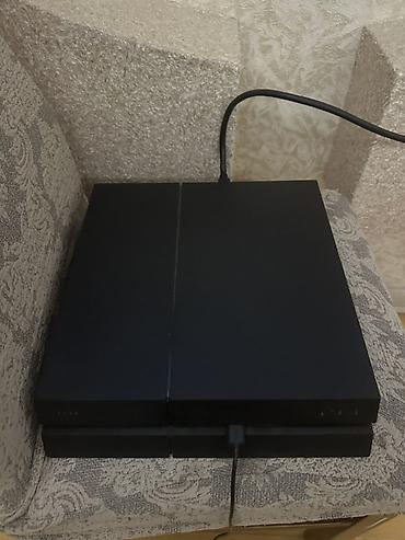 PS4 (Sony Playstation 4): PlayStation 4 (PS4) konsolu – DualShock 4 gamepadlarla Xüsusiyyətlər — 2