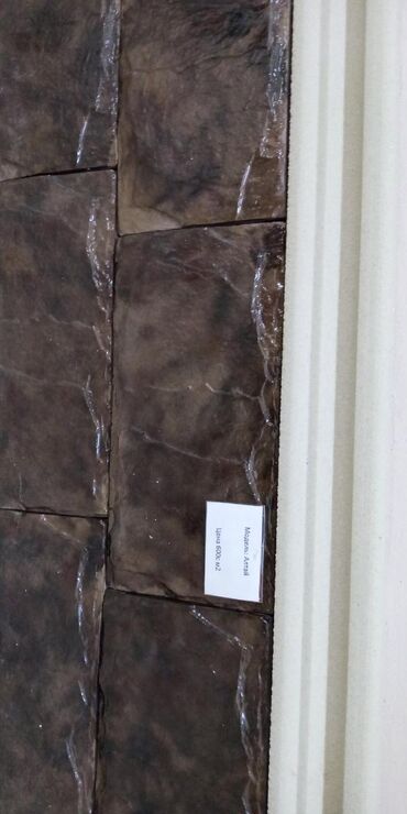Жидкий травертин: Каменные плитки для декора фасада здания