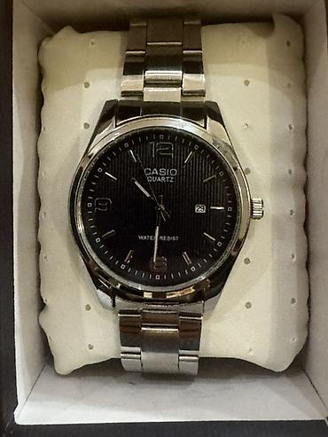 maqnit qolbaqlar: Casio Quartz kişi qol saatı - Klassik metal korpus və polad rəngli — 1