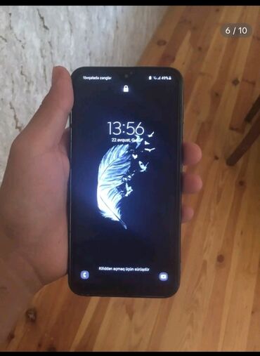 samsung a10 telefon: Samsung Galaxy A10, 32 GB, rəng - Göy, Düyməli, Simsiz şarj, İki sim kartlı