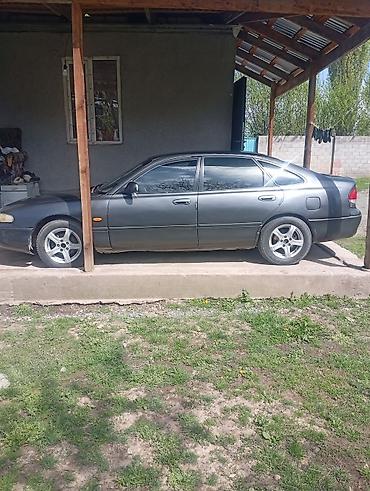zero x neo: Mazda Cronos: 1993 г., 2 л, Механика, Бензин, Хэтчбэк — 3