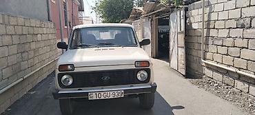 VAZ (LADA): LADA Niva 4x4 – ağ rəngli, 4qapılı SUV Əsas xüsusiyyətlər: - Tam — 1