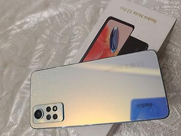 magic 6 pro: Xiaomi 12 Pro, 128 GB, 
 Sensor — 2
