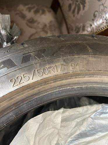 Шины: Комплект автомобильных шин в чехлах. Параметры: - Размер: 225/50 R17 — 2