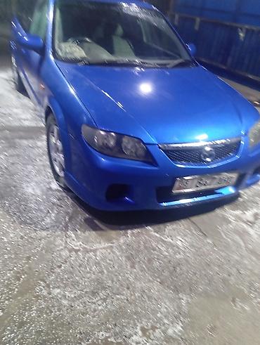 авто лейлек: Mazda Familia: 2002 г., 1.5 л, Типтроник, Бензин, Хетчбек — 1