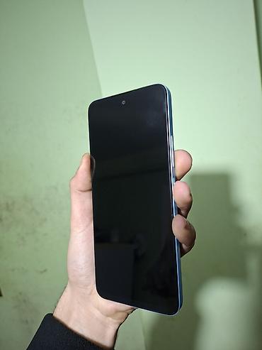 Redmi: Məhsul: Redmi smartfon - Rəng: Açıq mavi - Korpus: Düz (flat) kənarlı — 8