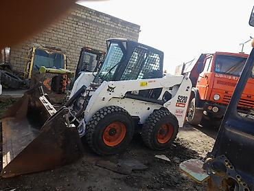 avtocar: Bobcat S220 skid steer yükləyici Xüsusiyyətlər: - Model: Bobcat S220 — 7