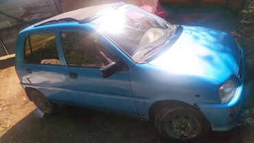 дамские машины: Daihatsu Cuore: 1996 г., 0.8 л, Механика, Бензин, Купе