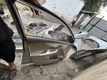 Защита радиатора: Разбор Toyota Corolla (E140/E150), седан, серебристый цвет. В наличии — 17