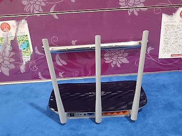 Модемы и сетевое оборудование: Wi‑Fi роутер TP‑Link (серия Archer/серый низ, глянцевая чёрная крышка — 1