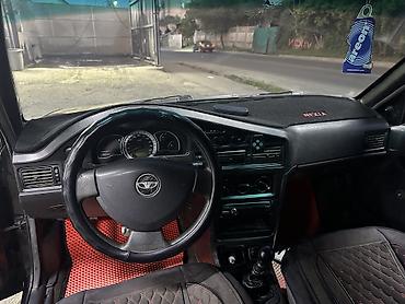 byd e6: Daewoo Nexia: 2011 г., Механика, Бензин, Седан — 7