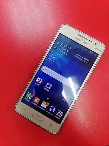 philips xenium 9@9s: Samsung Galaxy Grand Dual Sim, 2 GB, rəng - Qızılı, Barmaq izi, Düyməli — 5