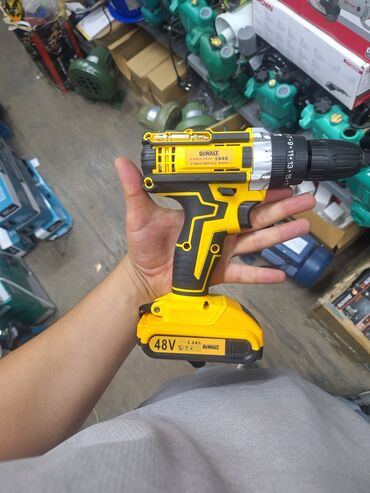 шуруповерт дрель купить: Аккумуляторная дрель-шуруповерт DeWalt в желтом и черном корпусе