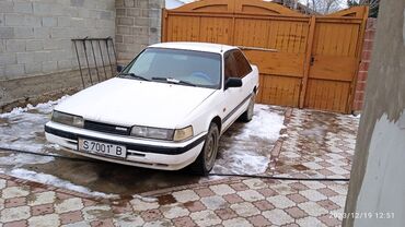 россия авто: Mazda 626: 1991 г., 2 л, Механика, Бензин, Седан