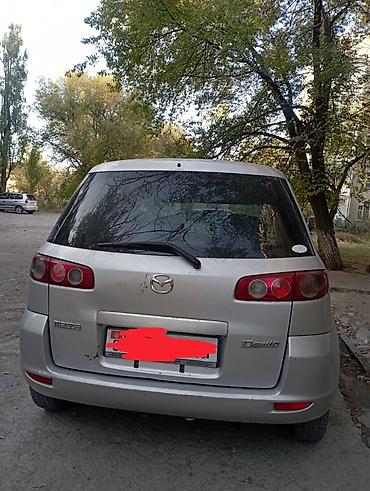 Транспорт: Mazda Demio: 2004 г., 1.3 л, Автомат, Бензин, Хэтчбэк — 2