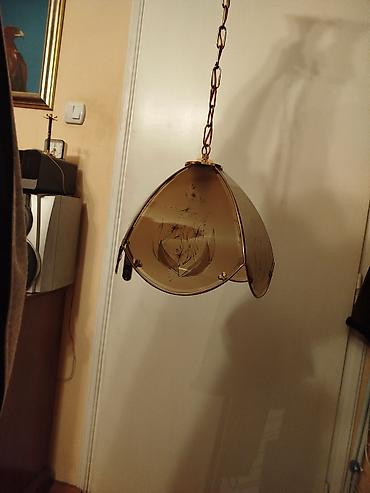 Rasveta: Zuckasti stakleni retro luster Donji kao precnik oko 34 cm. Visina — 1