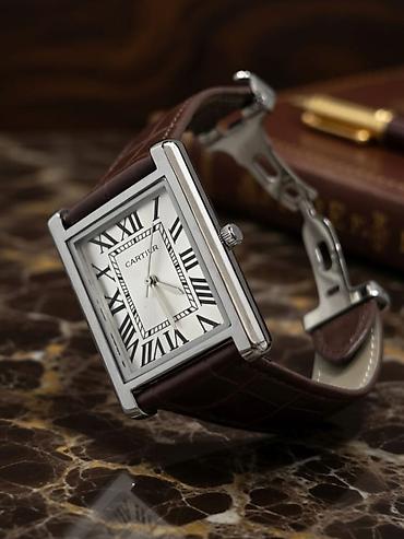 3d saat: Cartier Tank üslubunda kvadrat korpuslu klassik qol saatı Rolex, Rolex — 2
