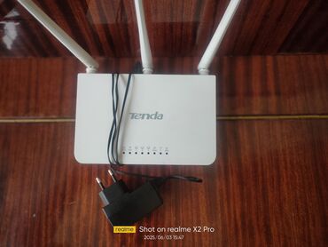 Modemlər və şəbəkə avadanlıqları: Tenda H300 şirkətinin üç antenli ağ rəngli Wi-Fi routeri. Evdə və ya lalafo.az -da Modemlər və şəbəkə avadanlıqları: Tenda H300 şirkətinin üç antenli ağ rəngli Wi-Fi routeri. Evdə və ya