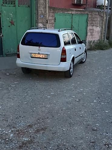 opel astra maşın: Opel Astra Caravan (ağ), universal kuzov - Geniş yük və sərnişin — 3