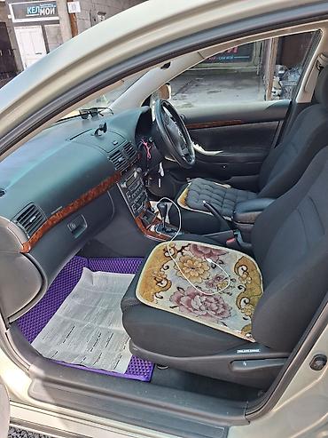 рул: Toyota Avensis: 2004 г., 2 л, Автомат, Седан — 8