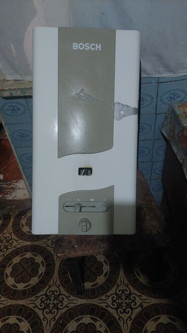 duş kranlari: Bosch qazlı ani su qızdırıcısı - Divara montaj üçün kompakt korpus -