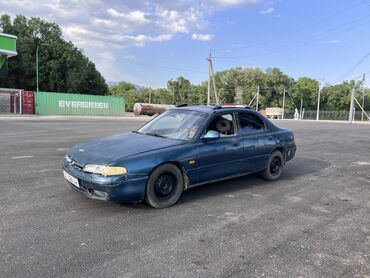 авто ока: Mazda Cronos: 1992 г., 2 л, Механика, Бензин, Седан