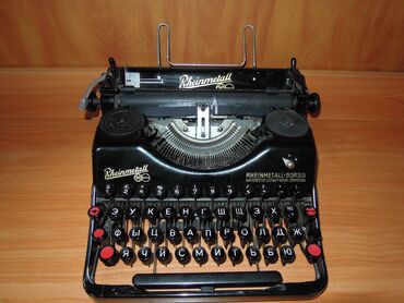 коллекция: Печатная пишущая машинка Rheinmetall рабочая но не хватает 2-х