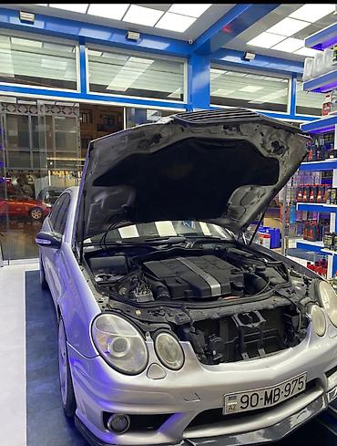 ford 7 1: Mercedes-Benz E 320: 3.2 l | 2002 il Sedan — 8