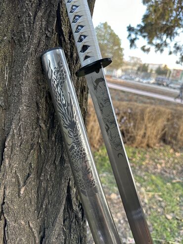 Коллекционные ножи: Мечи "Катана" Меч выполнен в японском стиле с рисунком драконов на