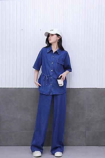 Костюмы с юбкой: Джинсовые комплекты для женщин Варианты: - Юбочный костюм из денима — 9