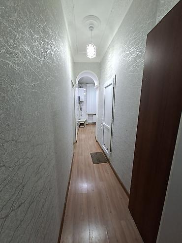 bakıda kreditle evler: 2 mərtəbəli binanın 1ci mərtəbəsi,qanuni 2 otaqlı,43kv+27kv artırma — 2